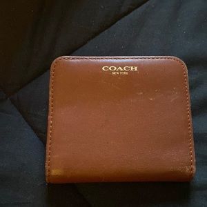 Woman’s coach compact wallet